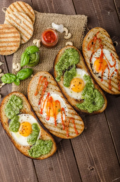 Vatiations of fried eggs inside bread