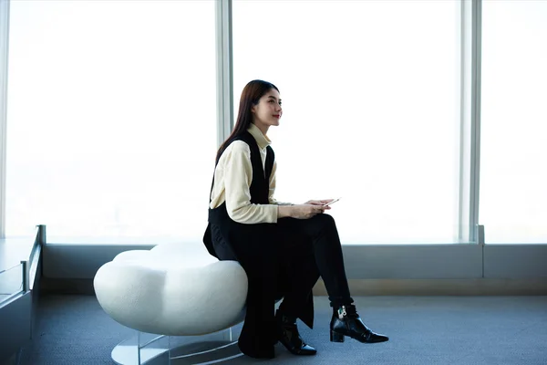 Young woman with mobile phone