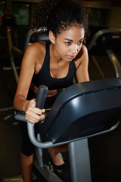 Attractive woman working out at gym
