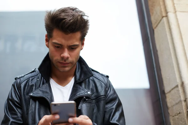 Man using busy smart phone