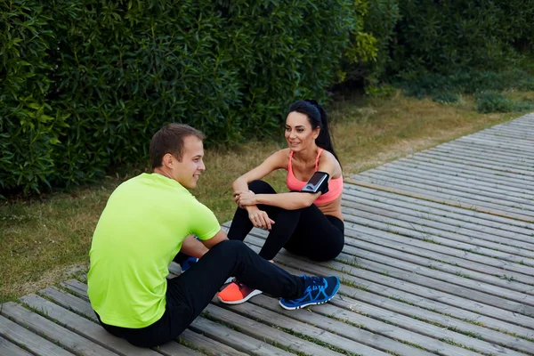 Sport couple resting after workout