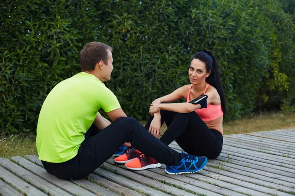 Sport couple resting after workout