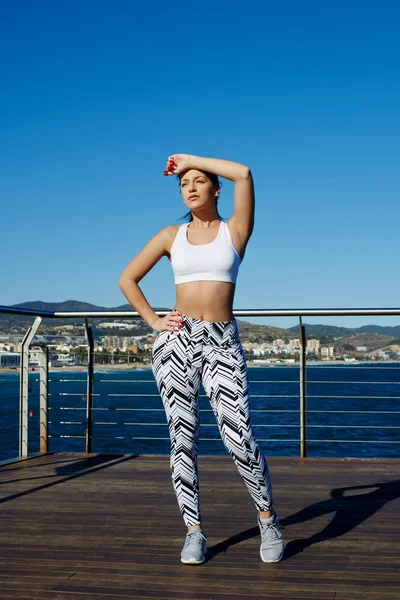 Female runner in beach