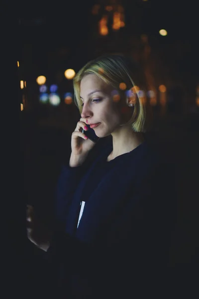Woman speaking on smartphone