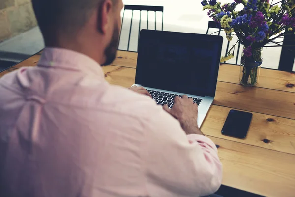 Male freelancer work on laptop computer