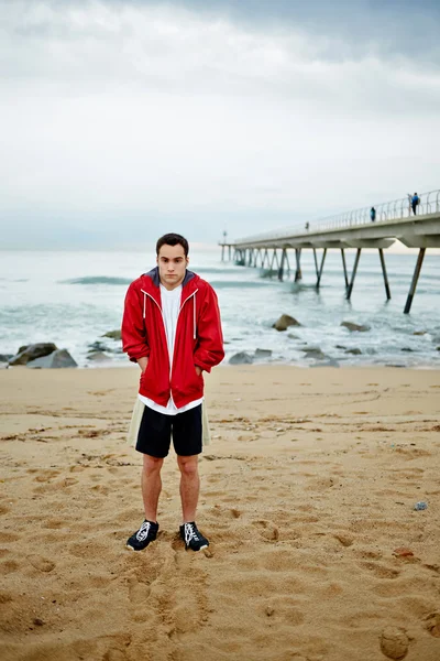 Male jogger taking break after run