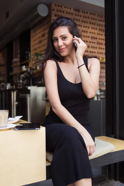 Attractive woman talking on mobile phone