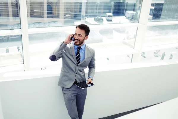 Businessman talking on mobile phone