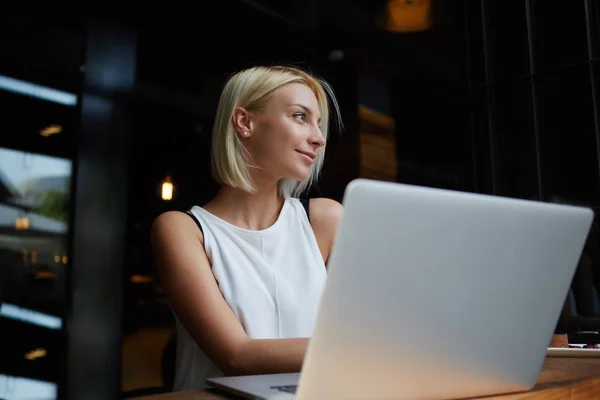 Elegant businesswoman working on laptop computer