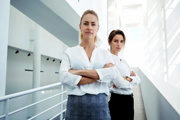 Team of  successful women with serious look