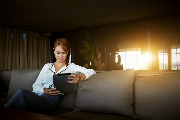 Businesswoman reading femenine blog