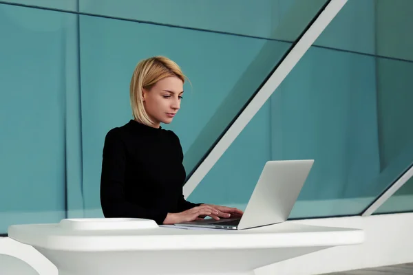 Businesswoman searching information in internet
