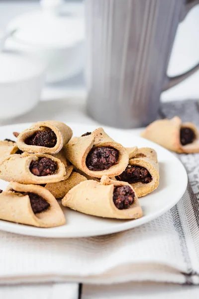 Corn cookies with paste from poppy seeds and dried fruit, vegan