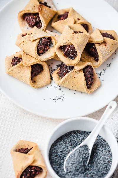 Corn cookies with paste from poppy seeds and dried fruit, vegan
