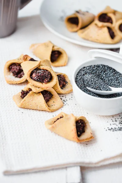 Corn cookies with paste from poppy seeds and dried fruit, vegan