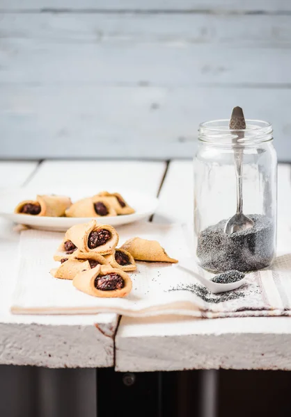 Corn cookies with paste from poppy seeds and dried fruit, vegan