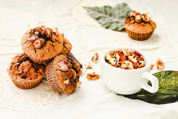 Chocolate brownies muffins with walnuts,  vegan autumn baking