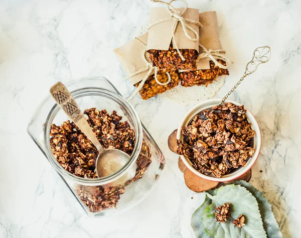 Chocolate homemade granola with peanut butter and pear