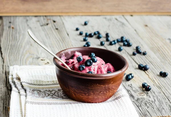 Banana ice cream with blueberries, healthy dessert, vegan