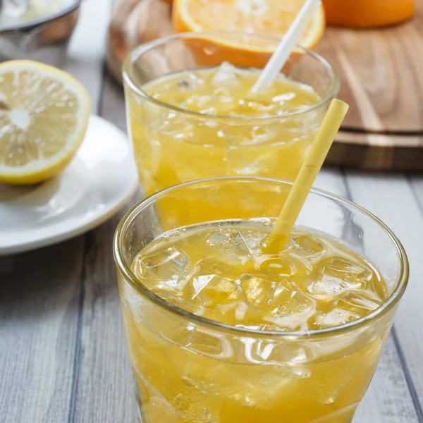 The cooled drink with fresh lemon and orange