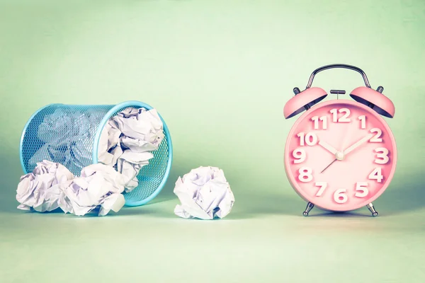 Retro and vintage style of Old fashioned alarm clock and clumple paper