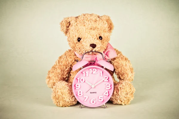 Retro and vintage style of Old fashioned alarm clock and doll