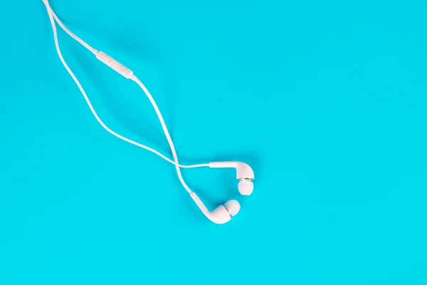 White earphones for using digital music or  smart phone