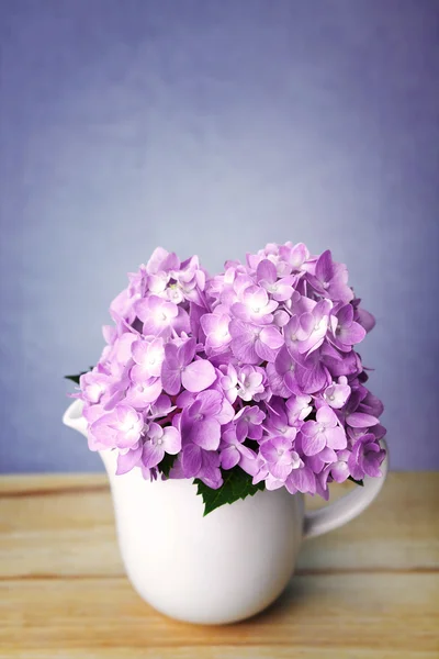 The sweet  hydrangea flowers in white vase