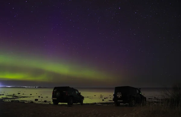 Leningrad region, lake Ladoga, Russia, April 12, 2016 , travel by Jeep Wrangler and Hammer H3