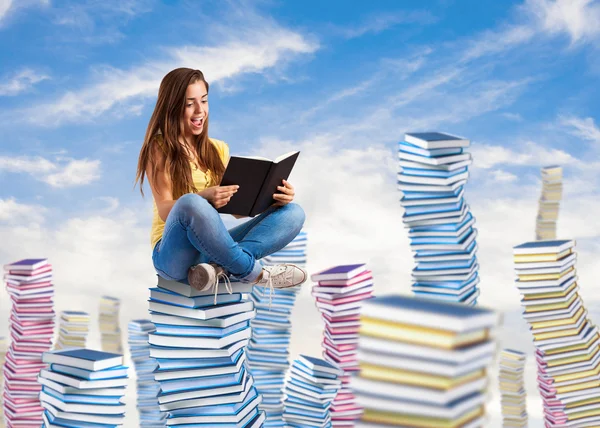 Young woman reading book