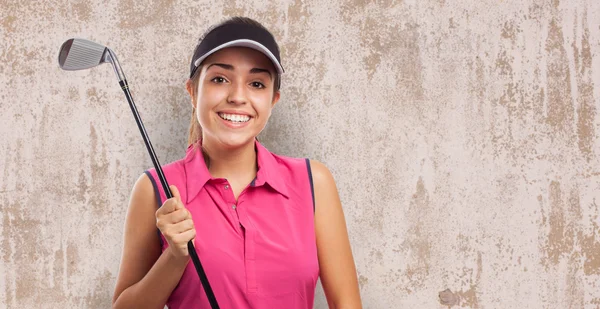 Pretty girl holding golf stick
