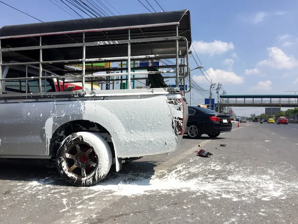 Car crash accident on road with splashing paint
