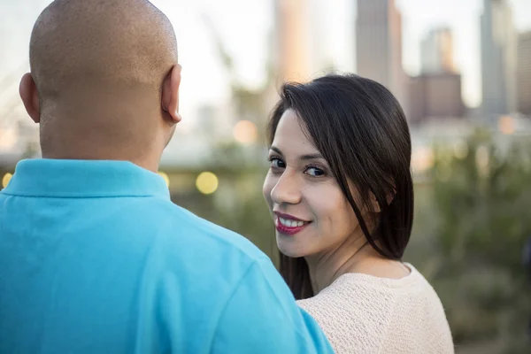 Latin couple on a date in a park