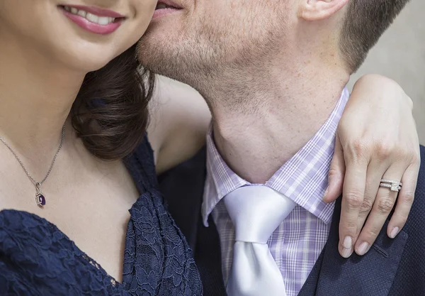 Romantic engaged  couple kissing