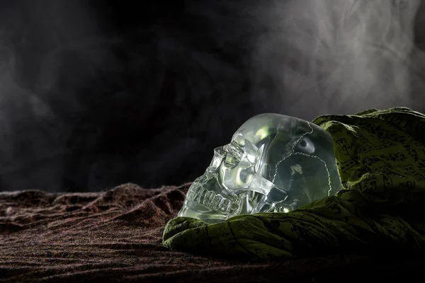 Crystal Skull on Smoky Background
