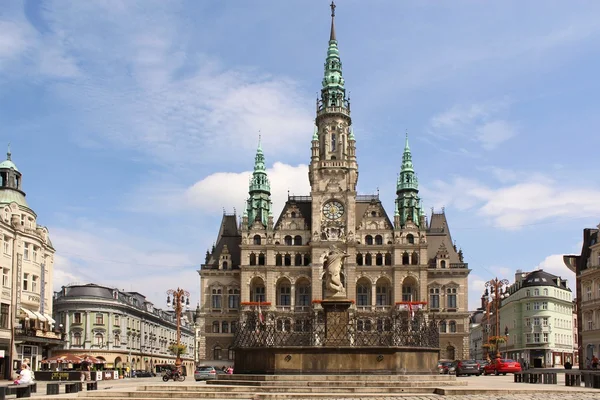 People walking by Liberec Town Hall in Czech Republic