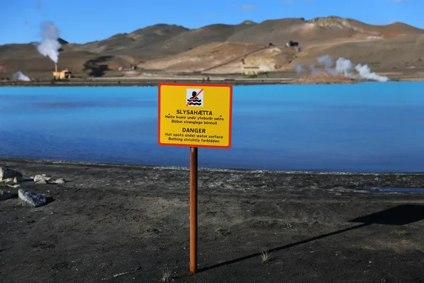 A warning sign near the waters of Bjarnarflag Geothermal Power Station