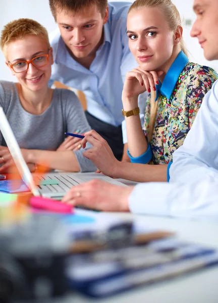 Young business people working at office on new project.