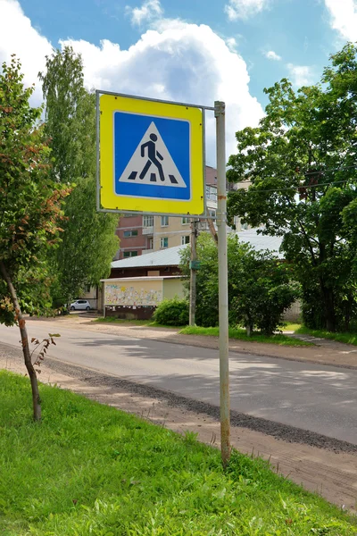 Road sign -pedestrian crossing- on city street