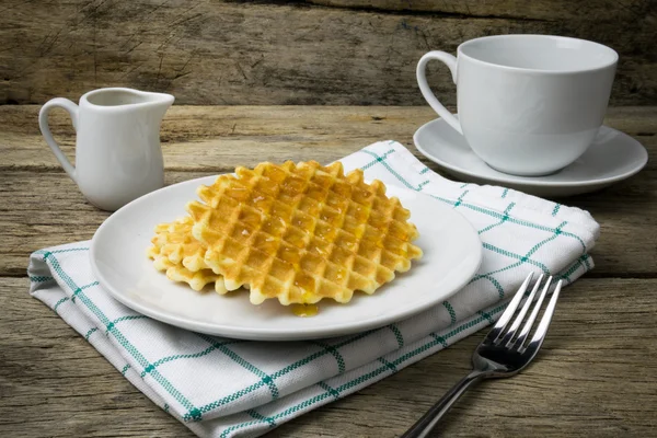 Waffle with a cup of Coffee and honey