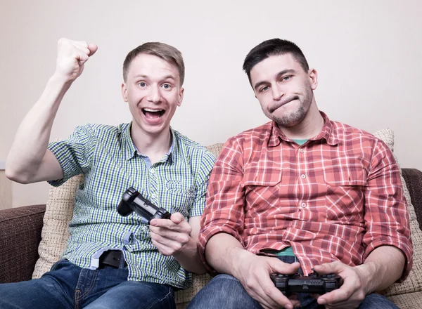 Two guys playing video games