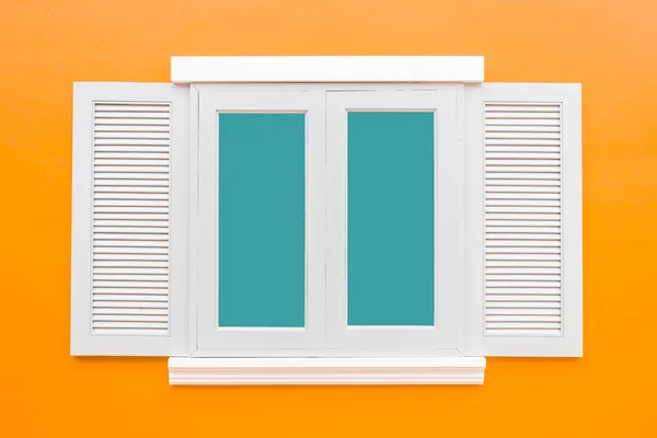 White window classic vintage on the color orange wall background