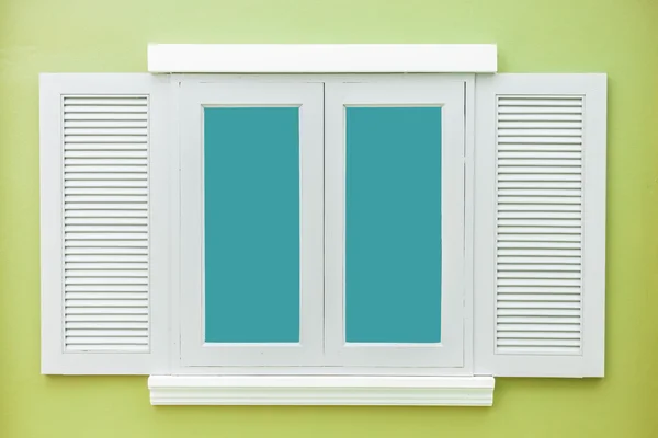 White window classic vintage on the color light green wall background