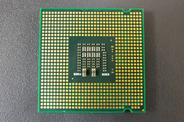 Computer CPU Chip on black surface background