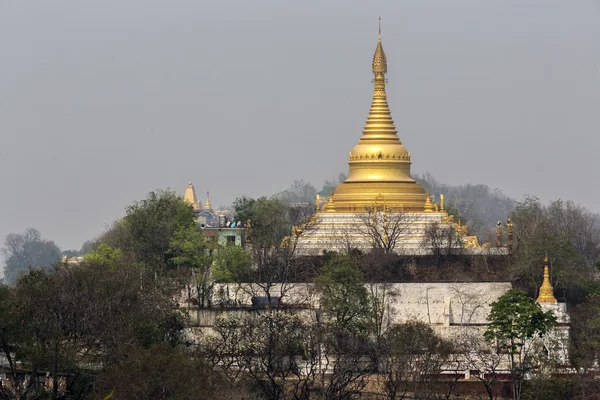 Golden pagoda is on Sagaing hill, Myamar. View frm the top of this hill.