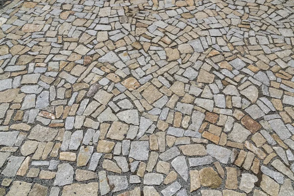 The stone pavement as the background texture.