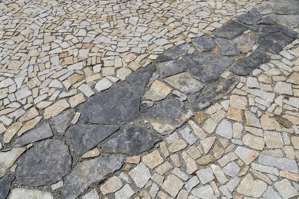 The stone pavement as the background texture.