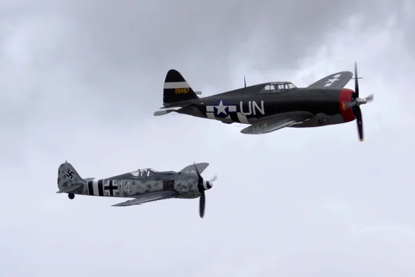 Airplane WWII fighters flying at 2016 Planes of Fame Air Show
