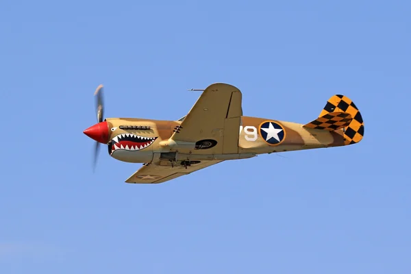Airplane vintage WWII P-40 Warhawk performing at 2016 Camarillo Air Show outside Los Angeles