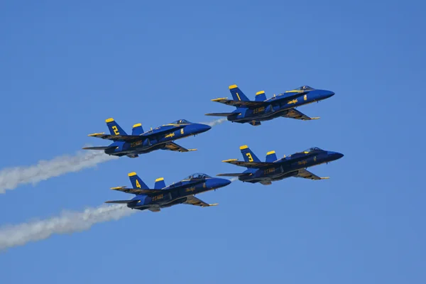 Airplane Blue Angels F-18 Hornet jet fighters flying at the 2015 Miramar Air Show in San Diego, California